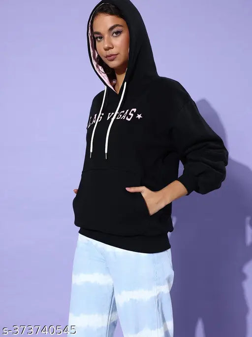 Black cotton oversized hoodie with printed design, long sleeves, and large fit. Made in India." (106 characters)