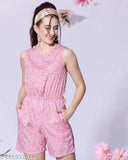 Pink crepe sleeveless summer short jumpsuit with floral print, ideal for a casual modern look. Elegant design, trendy one-step outfit. Style with white strappy sandals and sling bag. Sizes: S-B34/W32, M-B36/W34, L-B38/W36, XL-B40/W38, XXL-B42/W40, 3XL-B44/W42. Origin: India
