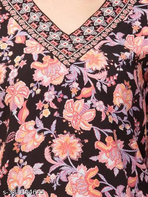 Black rayon floral printed women's top, three-quarter sleeves, XS (32in bust, 25in length). Floral design, Made in India