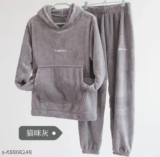 Women's woolen winter nightsuit with hood, made for cozy winters in soft and comfortable fabric. Solid color, long sleeves, and available in sizes M, L, XL, XXL. Handmade in India