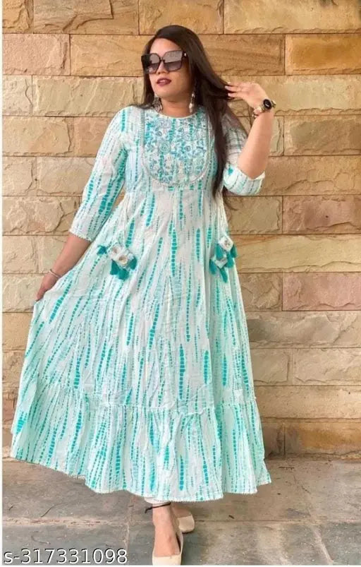 Green Rayon Prince Export Embroidered festival Gowen, three-quarter sleeve boho style for women's fashion, dyed/washed combo on display