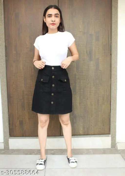 Black denim skirt on woman standing outdoors