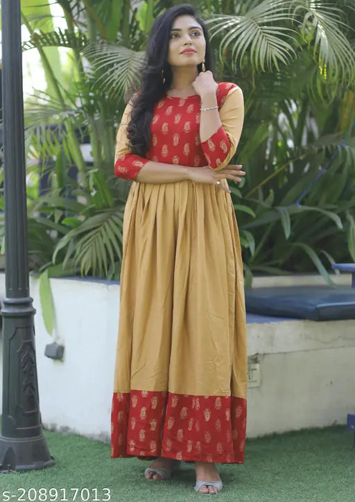 A woman in an ethnic dress made from rayon with foil print
