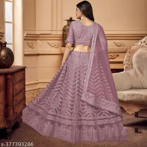 Pink net lehenga choli sequins and lace dupatta, semi-stitched Indian bridal wear for traditional events