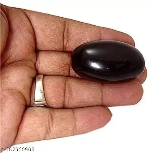 Natural black marble Lord Vishnu Shaligram, 4"x5"x3", signifies wealth and peace. One-piece god idol from India