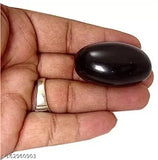 Natural black marble Lord Vishnu Shaligram, 4"x5"x3", signifies wealth and peace. One-piece god idol from India