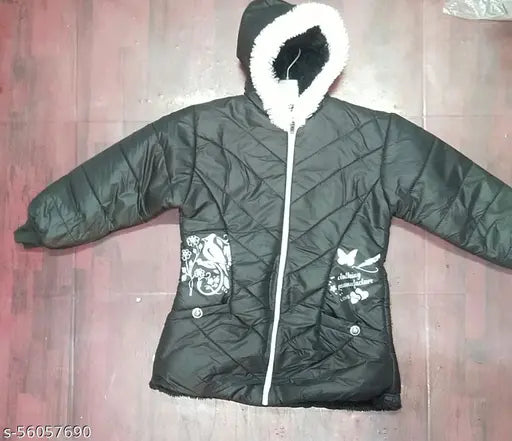 Black puffer coat with white fur trim, zip closure and embellished designs on front