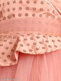 A full length dress with embellishments in pink and gold, suitable for children's party wear