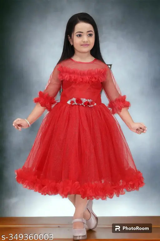 Net party dress with three-quarter sleeves, vibrant printed design for kids aged 4-10 years. Made in India