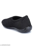 Black canvas women's shoes with slip-on design, PVC sole on display. Size: IND-7 (foot length size: 26cm), made in India