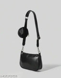 Trendy black leather purse with silver accents and a side pocket