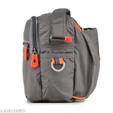 Black and grey sling bag, women's messenger style with multiple zip pockets