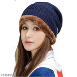 A soft beanie cap in blue, inside a fur-lined snowproof winter hat