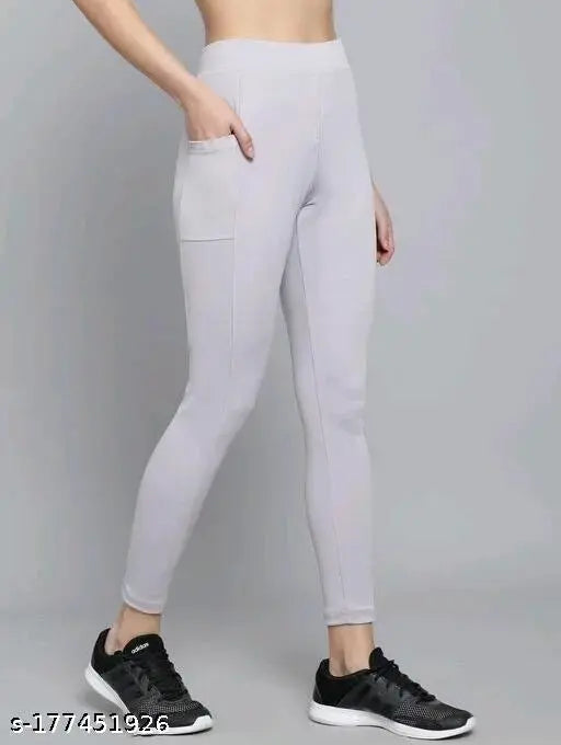 Solid net, 4-way stretch Lycra leggings by Earth Joy for women's athletic wear. Ideal for yoga, running, gym." (117 characters)