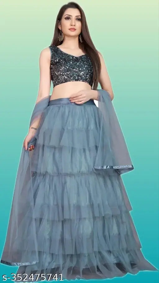 Velvet-embellished ruffle Satara Lehenga Choli with net dupatta, sequin work, semi-stitched; Indian bridal wear on display