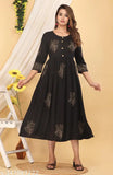 Black, long-sleeve dress with flared skirt and embroidery detailing