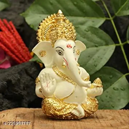 Gold-plated ceramic Car Dashboard Ganesha Idol, 3.5 x 2 inches, hand-painted terracotta finish. High-quality Hindu god sculpture for home decor and gifting
