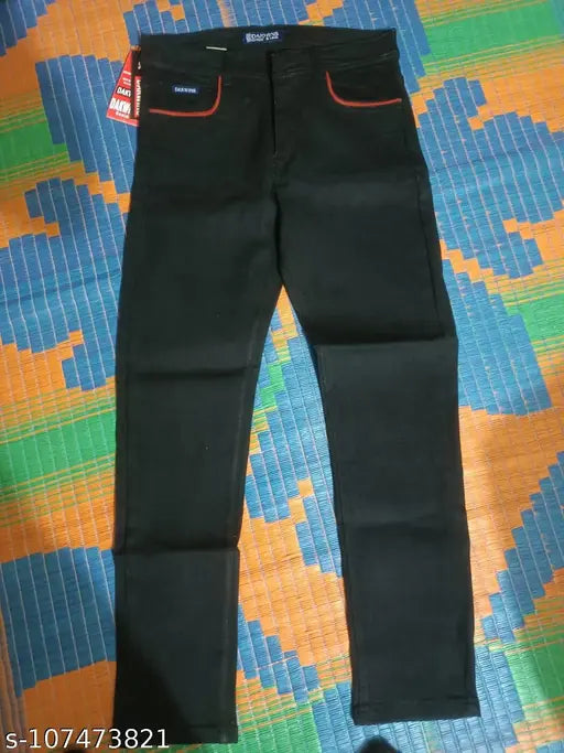 Black denim men's jeans with red pocket detail from DAKWINS - stylish, stretchable, and durable for casual or special occasions. Size options: 28, 32, 34 (inseam: 39"). Made in India
