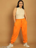 Orange nylon jogger pants by NOBARR, elasticated waist with drawstring detail, ankle length, made in India