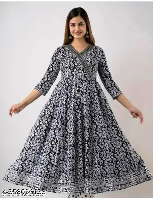 Black rayon Anarkali gown with embroidered sequence, three-quarter sleeves. Close-up of intricate embellishments on Indian bridal wear. Sizes M (38in bust, 46in length), L (40in bust, 46in length), XL (42in bust, 46in length), XXL (44in bust, 46in length), XXXL (Indian sizes)