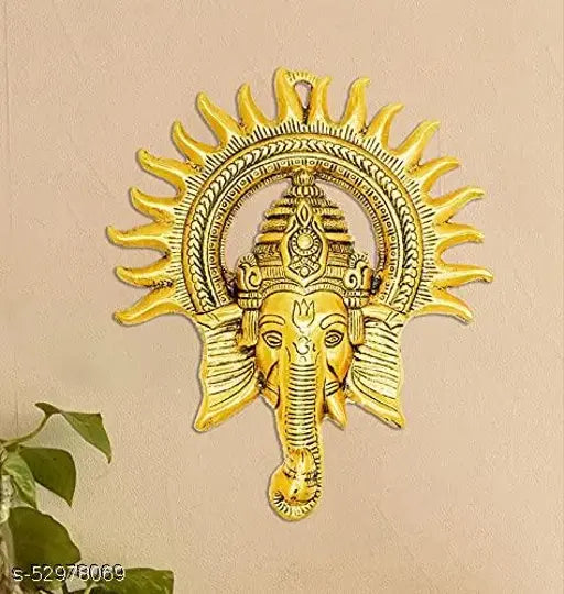 Gold metal Ganesh idol with chakra, 23cm tall for home and office decor