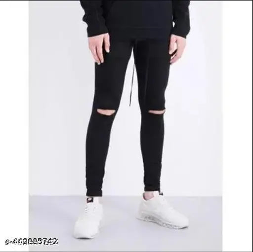 Black denim jeans with knee cut detail, perfect for men's fashion