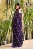 Purple and gold sari, long and flowing