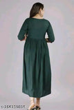 Green dress with ruched detailing, V-neck, long sleeves