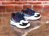 A pair of lightweight kids' sneakers with a led light on top, Velcro straps, and a casual design