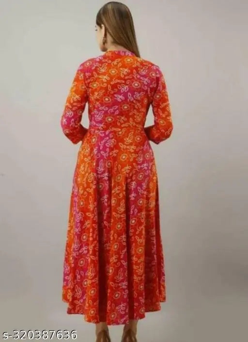 Rayon printed three-quarter sleeve kurti for women, stylish umbrella pattern on a Indian clothing rack