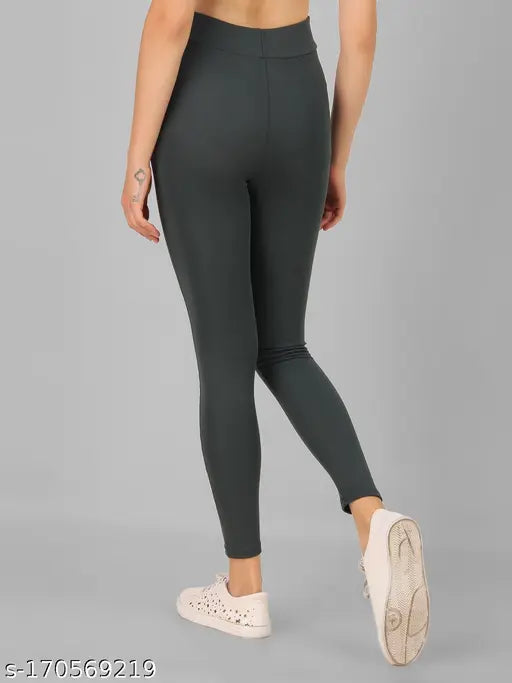 Green solid pocket jegging for women & girls, stylish and made from polyester. Shown in size 30