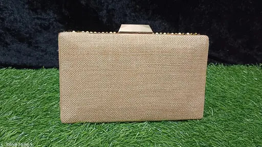 Tan jute fabric clutch with a metallic gold button accent, for special occasions