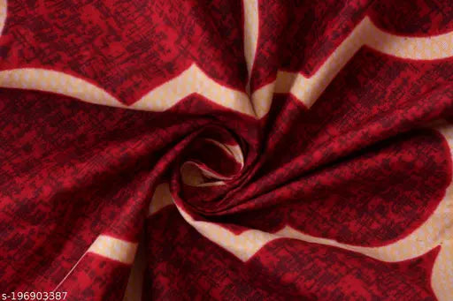 Red and white patterned bedsheet with white trim, soft cotton material.