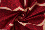 Red and white patterned bedsheet with white trim, soft cotton material.