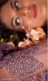 Purple embroidered lehenga set: net topwear & bottomwear, intricately embroidered dupatta. Traditional semi-stitched design for custom fit, suitable for girls and women. Indian bridal wear