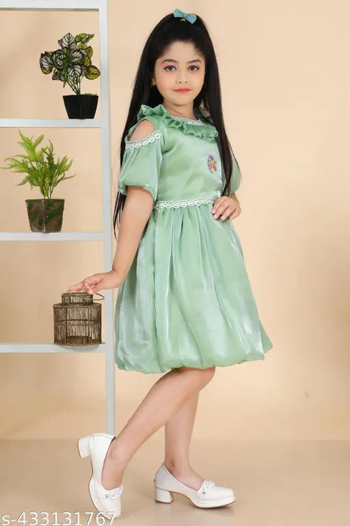 The image is not of a product, but rather features an individual posing with a plant