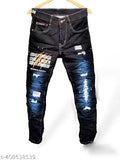 Black, distressed jeans with a graphic print, men's fashion streetwear