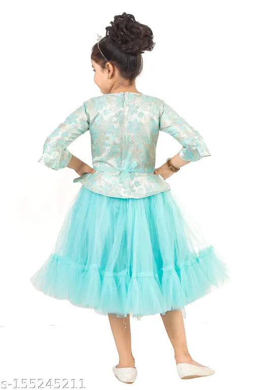 A girl's light blue tulle skirt, with a visible waistband and long sleeves