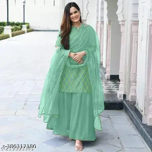 Beautiful traditional rayon print kurta sharara and net dupatta set