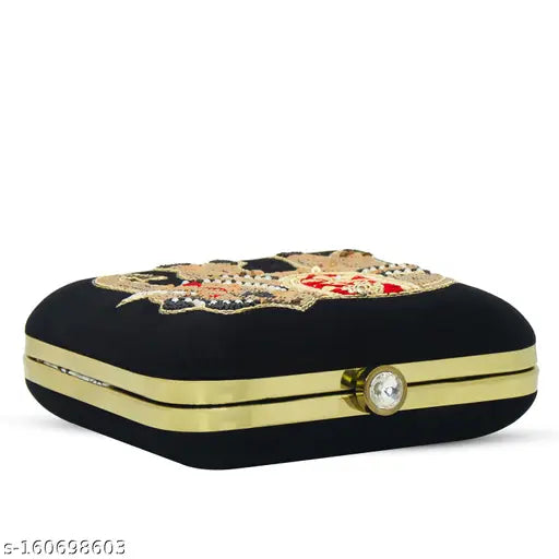 Black embroidered velvet clutch purse with gold accents, suitable for parties