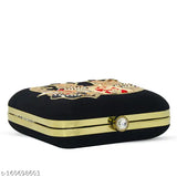 Black embroidered velvet clutch purse with gold accents, suitable for parties