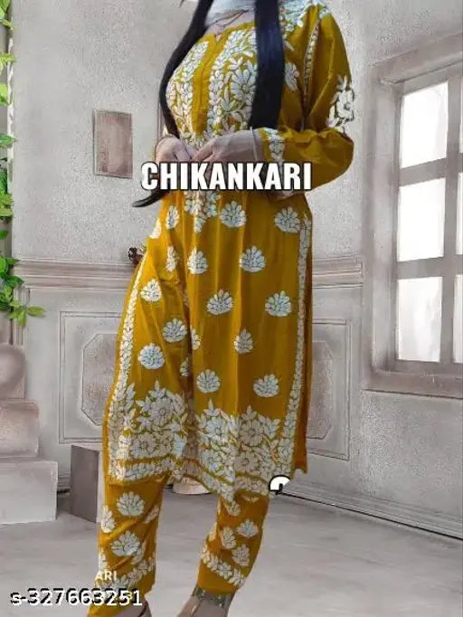 Rayon kurti and pant set with three-quarter sleeves, woven design on display