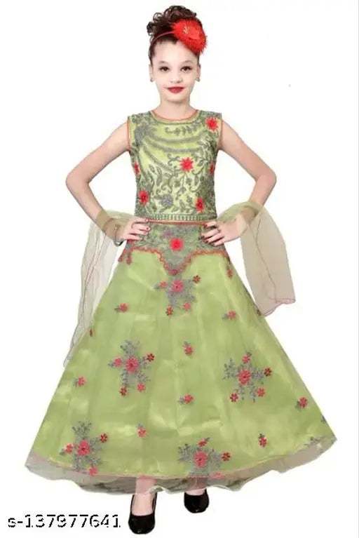 Modern stylized frock, girl's dress in green with floral embroidery and ruffled hem