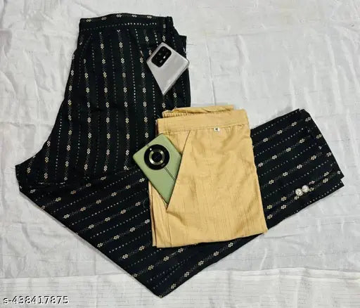 Black, patterned pants and top set with phone case
