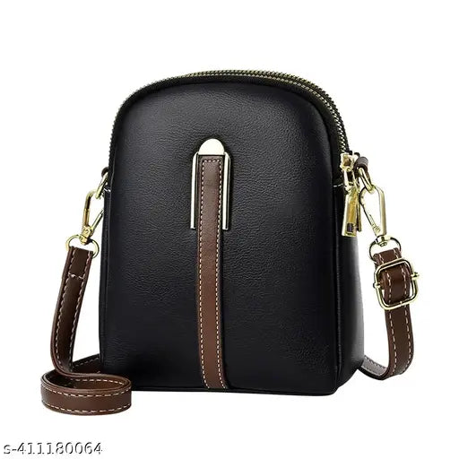 Sleek black PU women's crossbody sling bag. Large detachable belt for adjustable fit. Double layer design. Zipper pouch for extra storage. Ideal gift for women