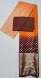 Orange and black traditional Indian fabric with paisley design