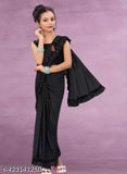 Poly silk ruffle kids sari with velvet blouse, solid pattern and sequence net, ready to wear trending design, available in various sizes from 3-4 years to 12-13 years. Indian origin