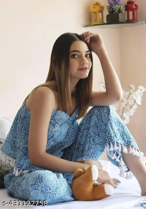 Floral printed rayon night suit set: stylish sleepwear featuring a top and bottom, sleeveless with sweetheart neck and elastic waistband, in vibrant floral pattern