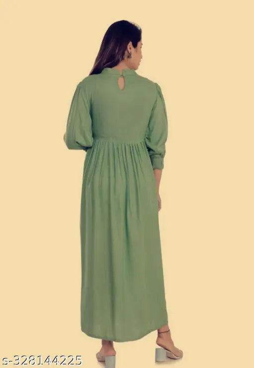 Blue cotton maxi dress with V-neck, empire waist, and long sleeves