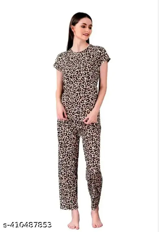 Printed cotton blend nightsuit set for women, featuring leopard print T-shirt and pants, elastic waistband with side pockets, ideal for relaxed fit and gifting. Made in India